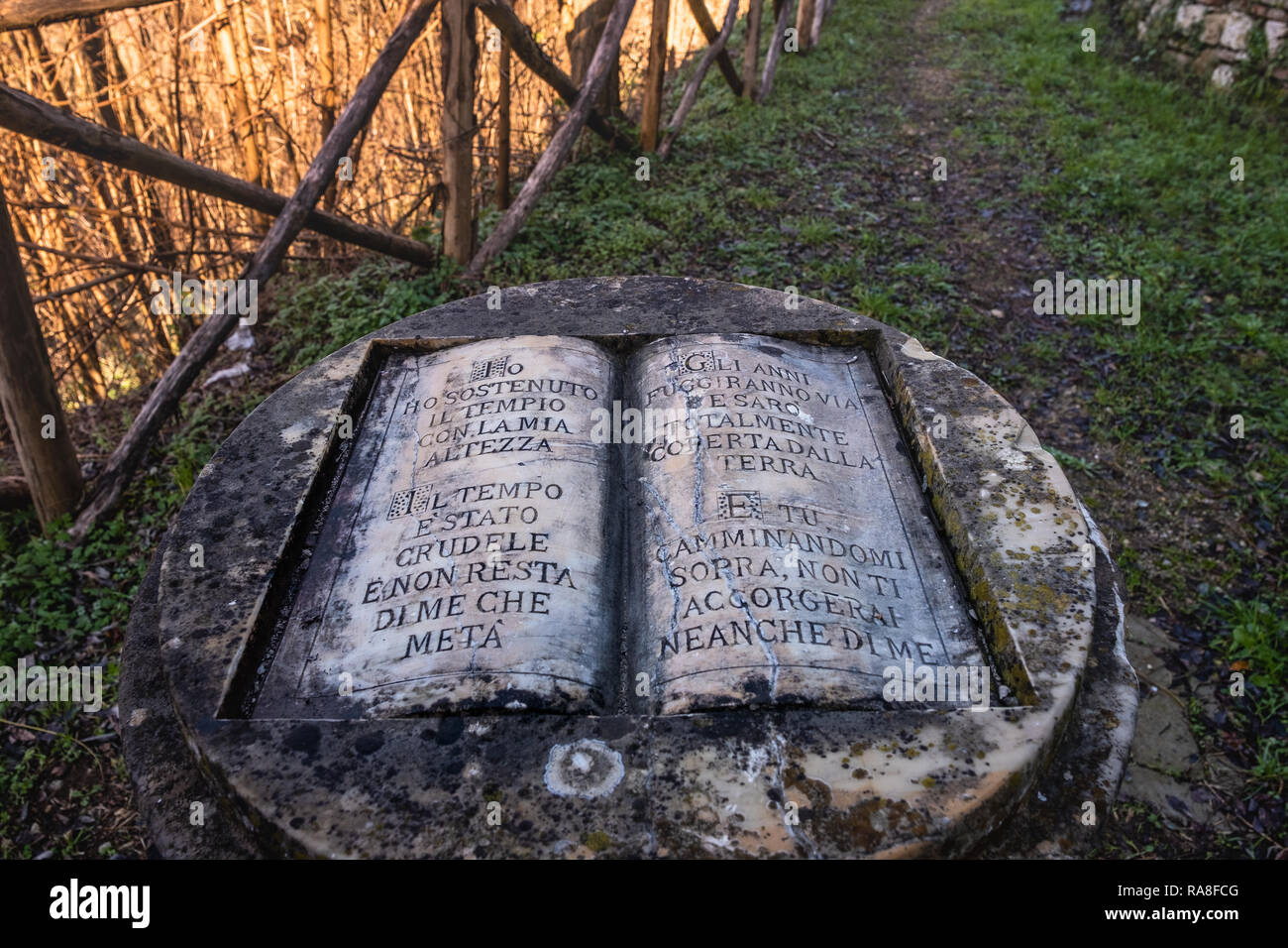 COLLE VAL D’ELSA, ITALY - DECEMBER 26, 2018: Work of the artist Ilya Kabakov, The weakening voice, 1998, Siena yellow marble, Art project for art for  Stock Photo