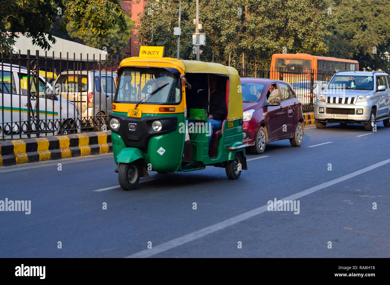 Auto racing away in Connaught Place, Delhi, India Stock Photo Alamy