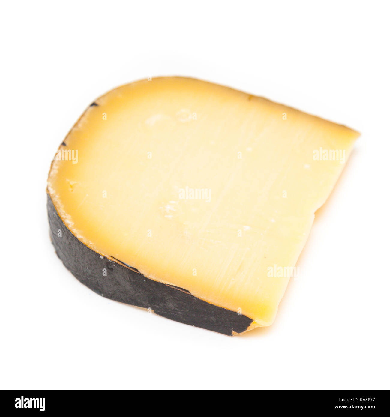 Dutch Extra Mature Gouda Cheese isolated on a white studio background Stock Photo