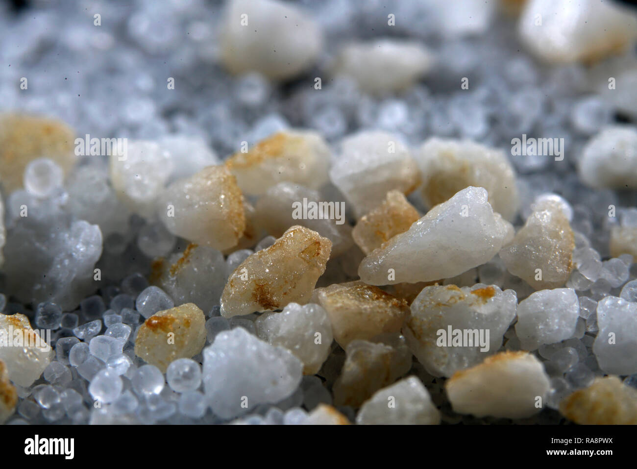 Salt in various forms with the macro lens extremely enlarged, it almost micro photographs are Stock Photo