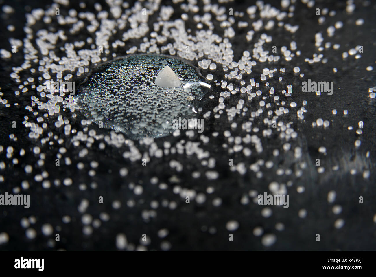 Salt in various forms with the macro lens extremely enlarged, it almost micro photographs are Stock Photo