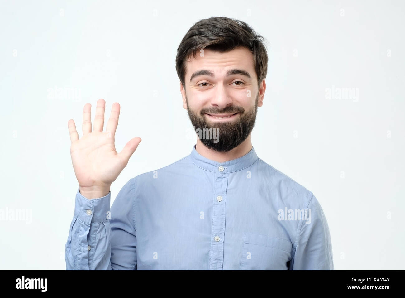 Positive human emotions. Friendly looking polite young hispanic man ...