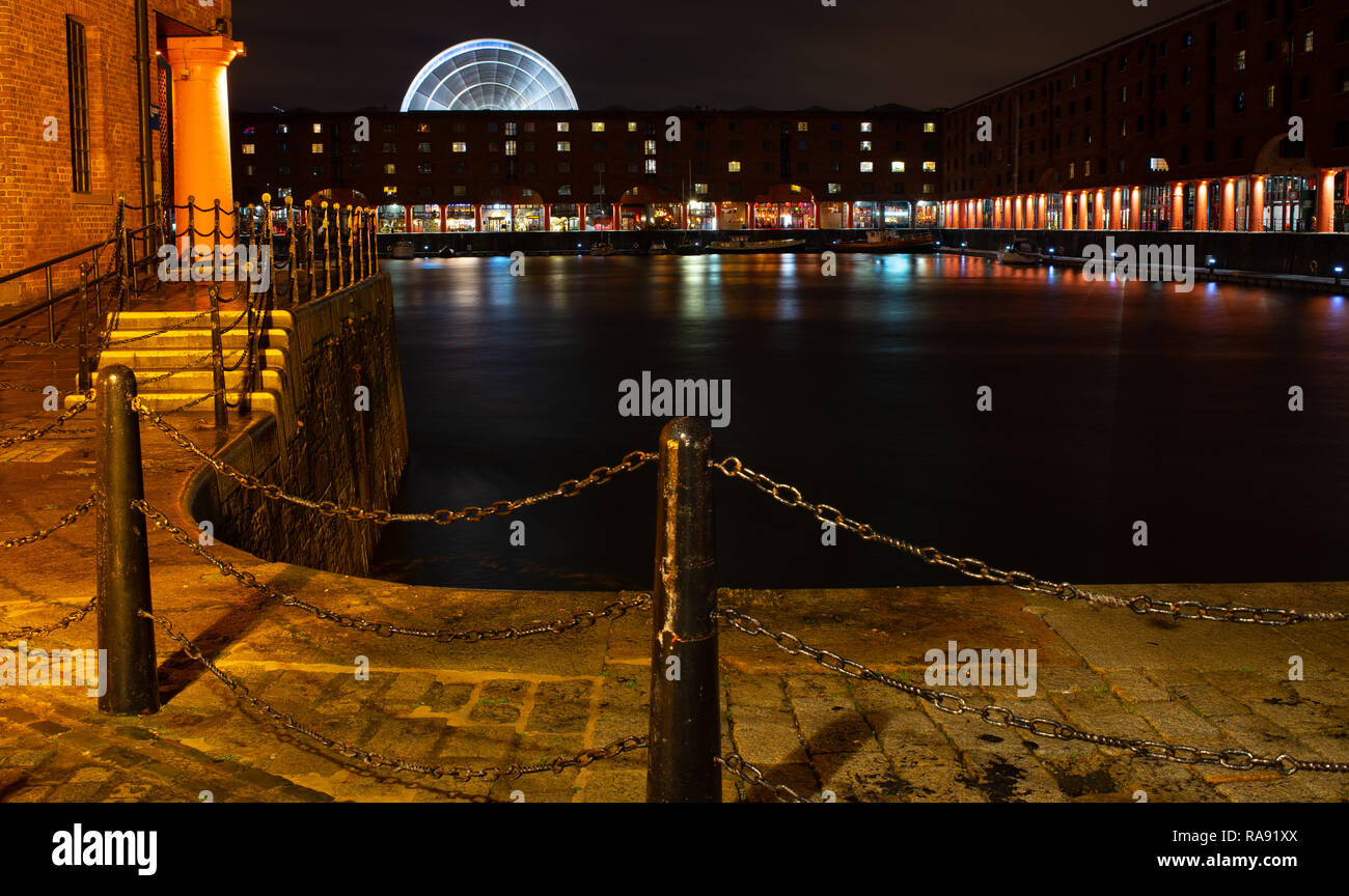 Albert Dock, Liverpool, Ferris wheel in the background. Image taken in October 2018. Stock Photo