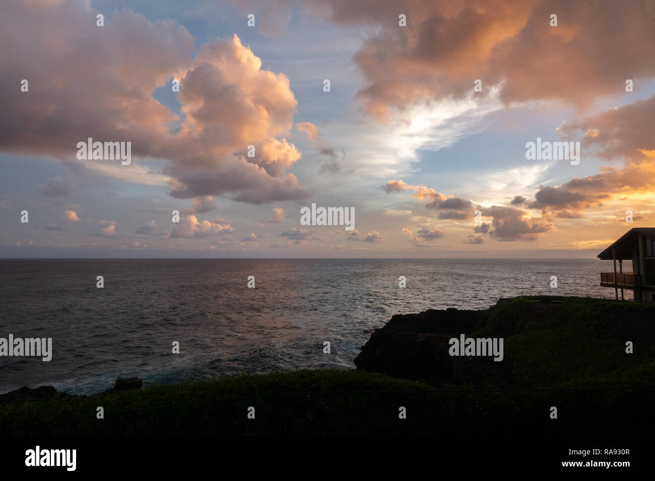 Dramatic clouds over the ocean at sunset Stock Photo - Alamy