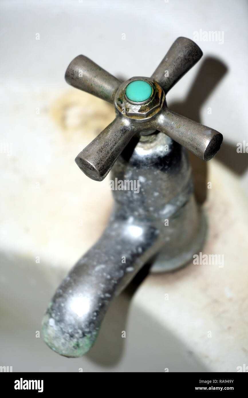 dirty bathroom sink faucet with Limescale buildup Stock Photo Alamy