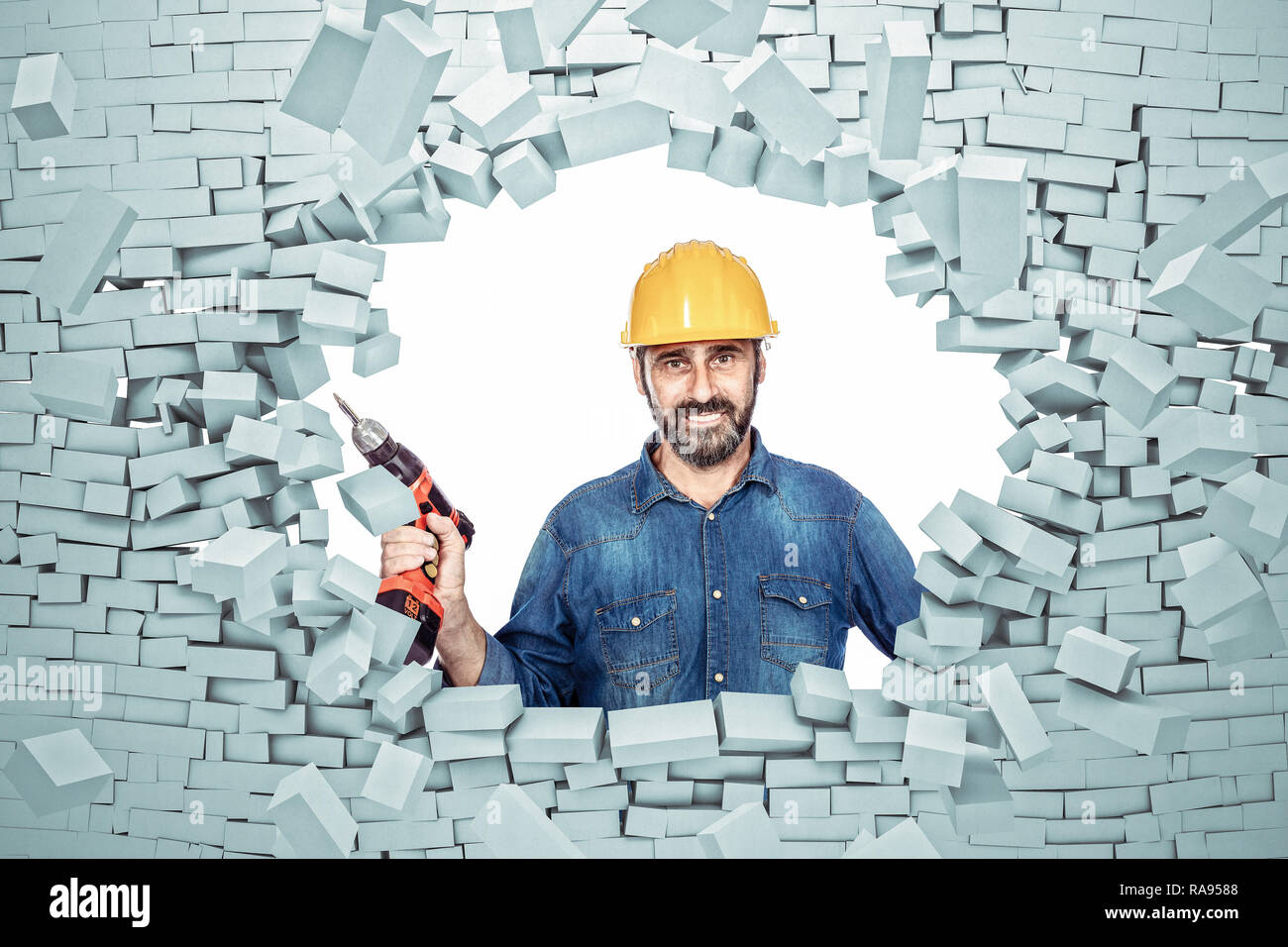 brick explosion and handyman Stock Photo Alamy
