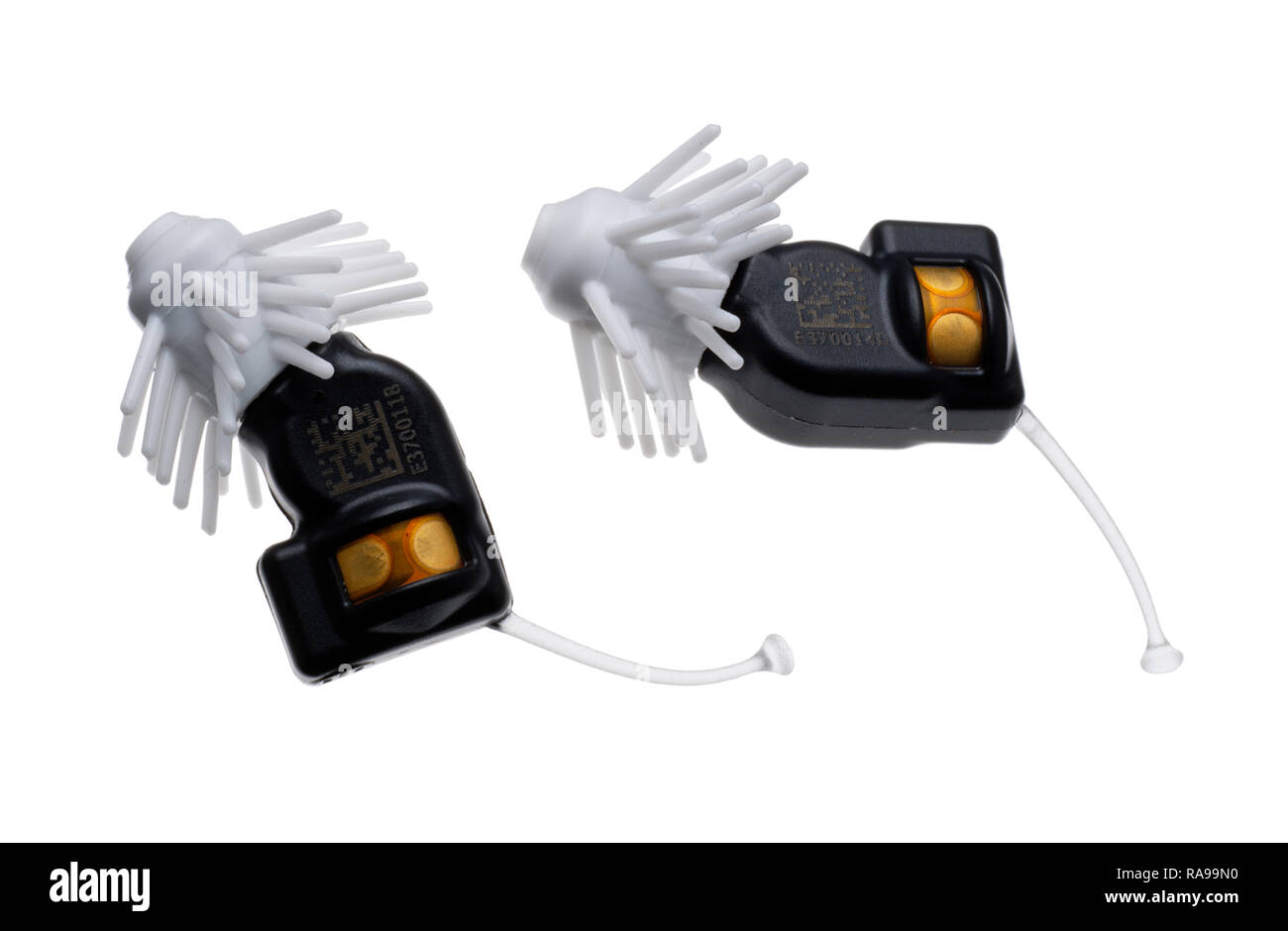 Eargo hearing aids as a pair. Cutouts ona white background. Stock Photo