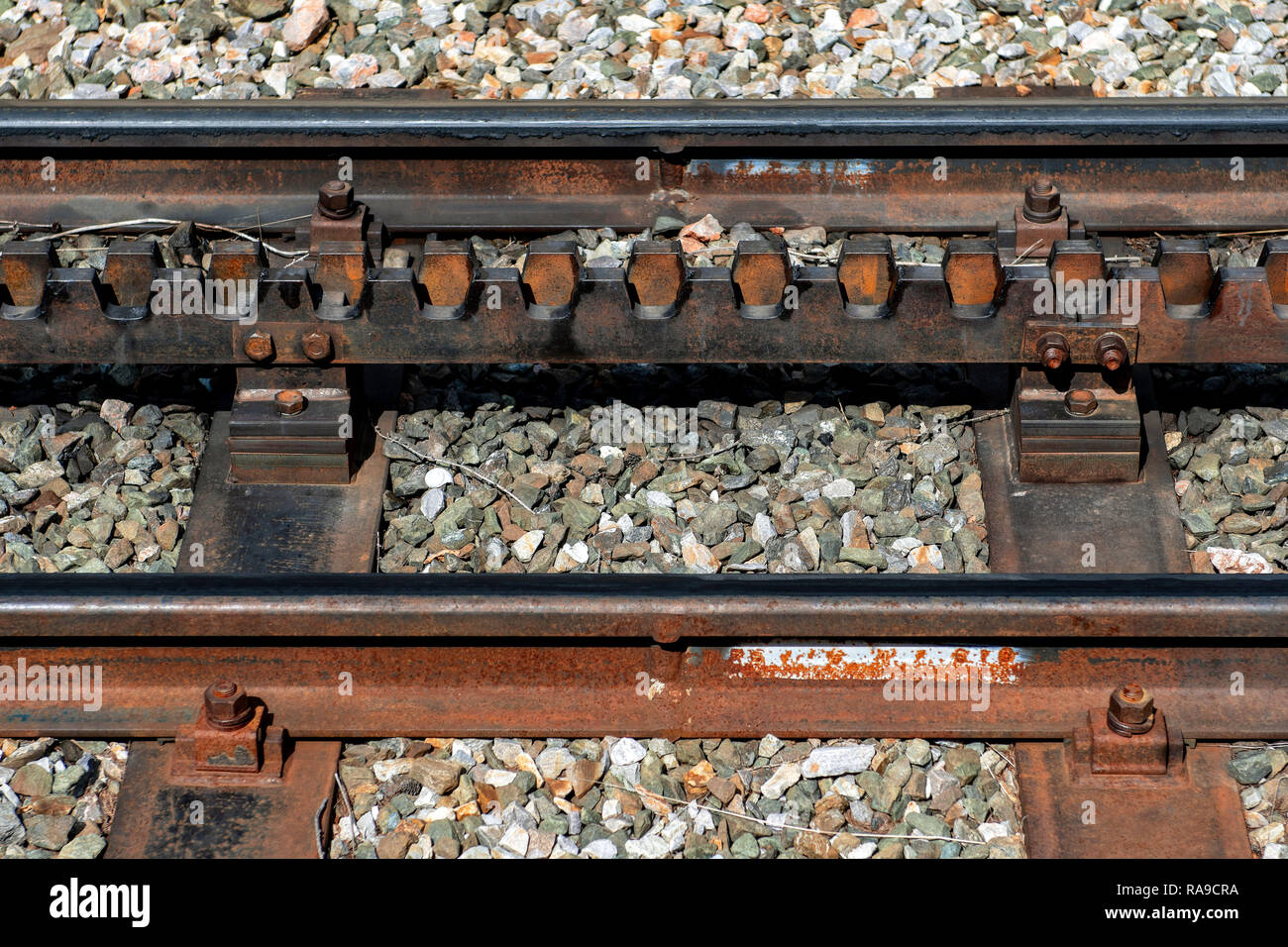 Closeup of a railroad track with a rack Stock Photo Alamy