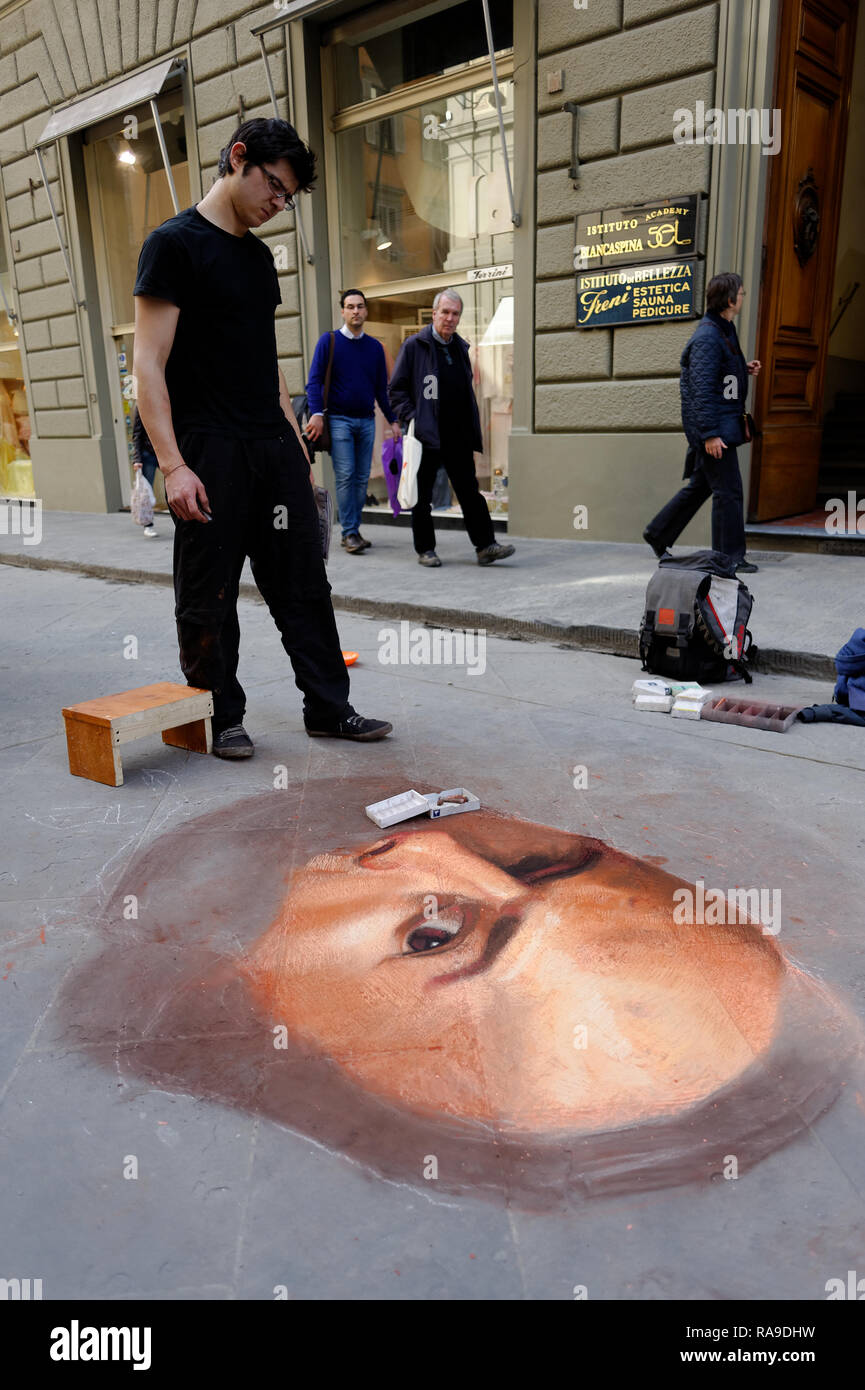 City street scene: making a portrait on a pavement Stock Photo