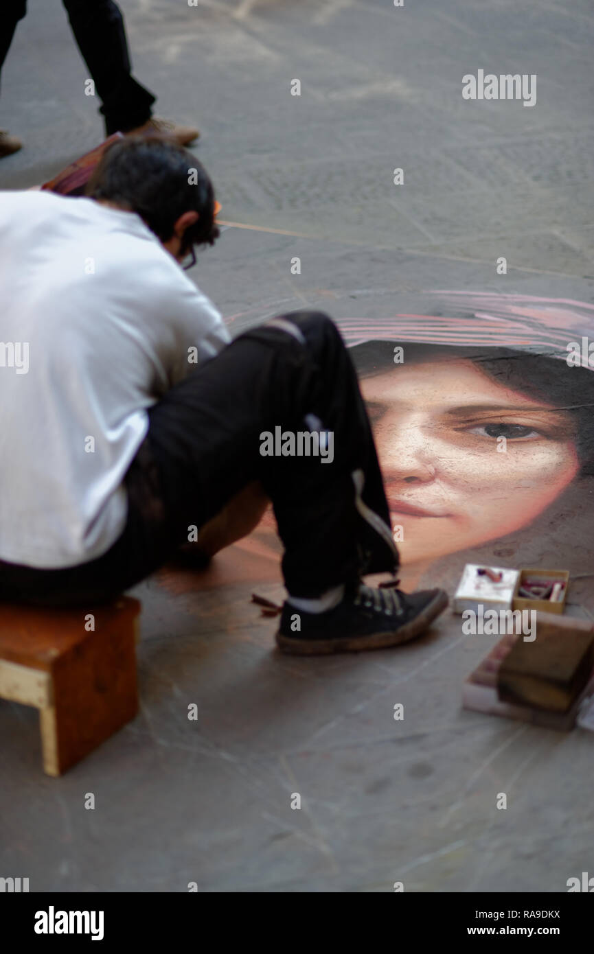 City street scene: making a portrait on a pavement Stock Photo