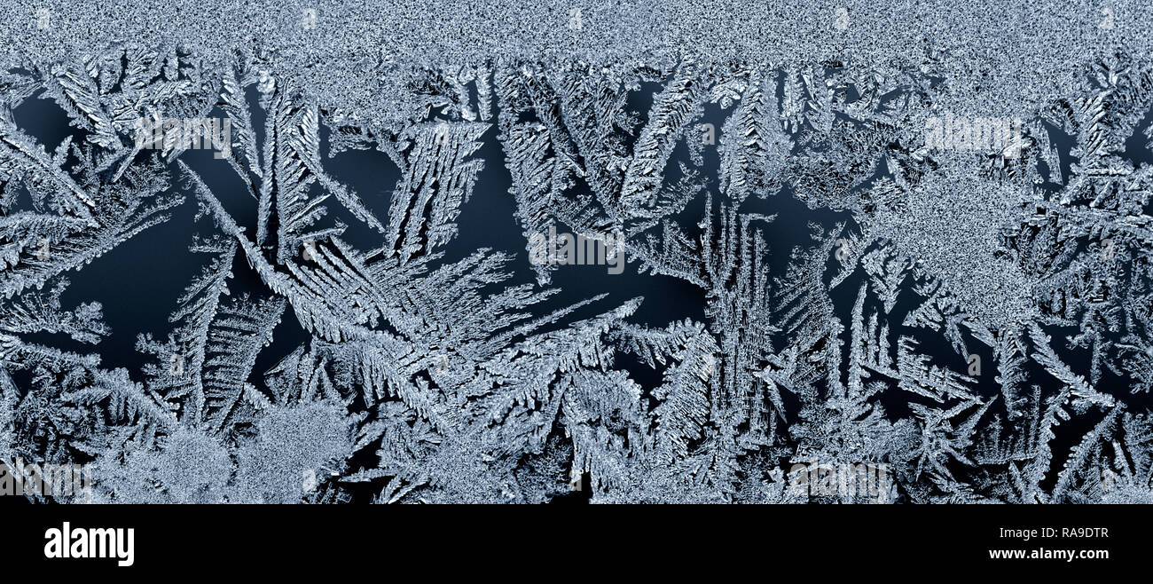 Backgrounds and textures: frost pattern on a window glass Stock Photo ...