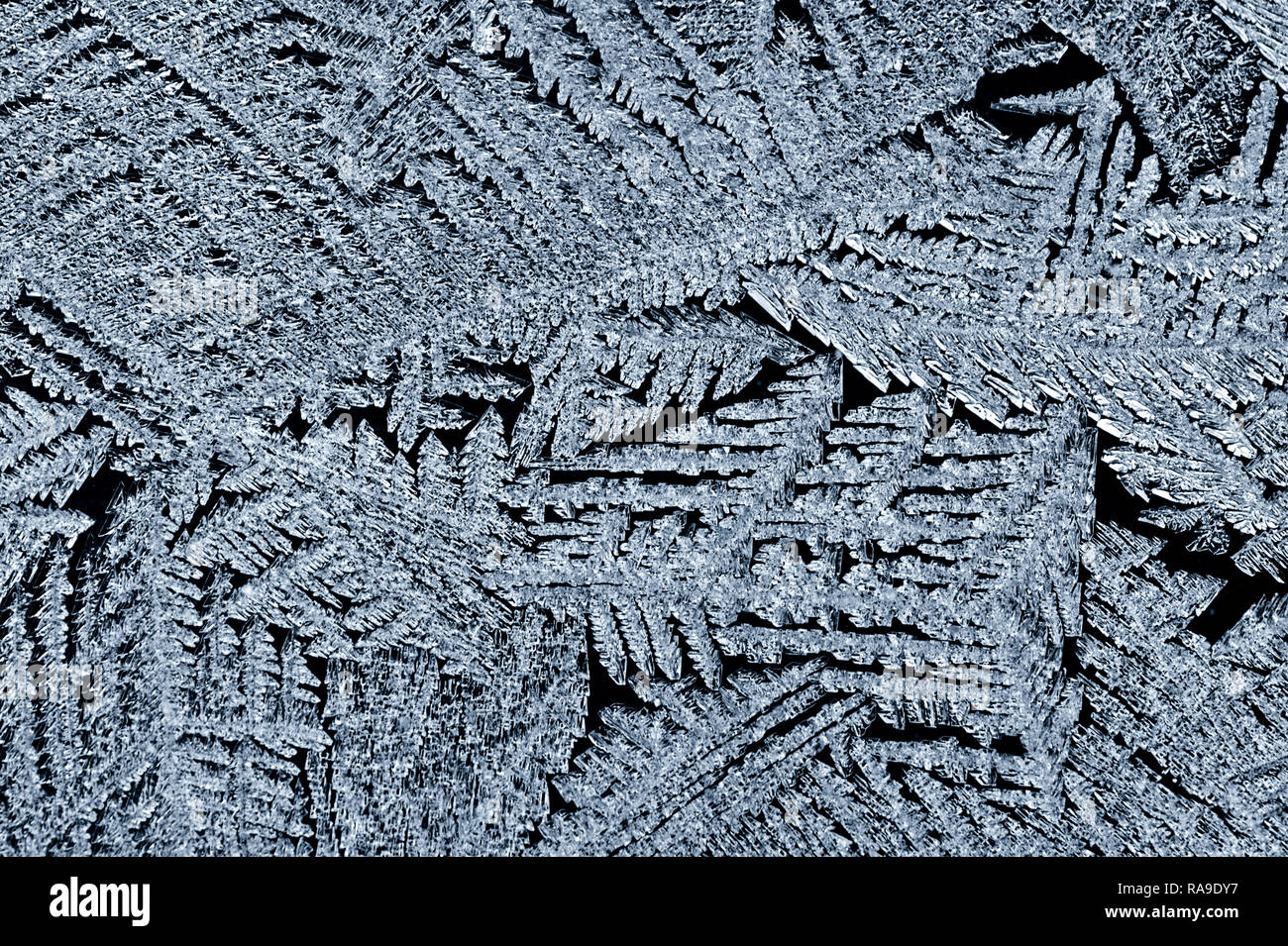 Backgrounds and textures: frost pattern on a window glass Stock Photo ...
