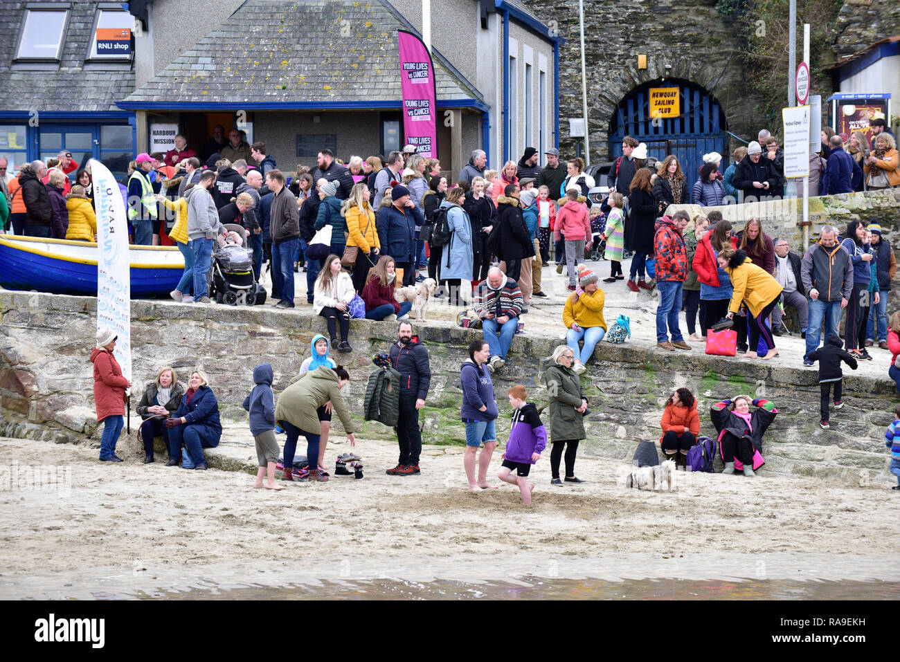 A large crowd of people gathering in Newquay Harbour Harbor in Cornwall. Stock Photo