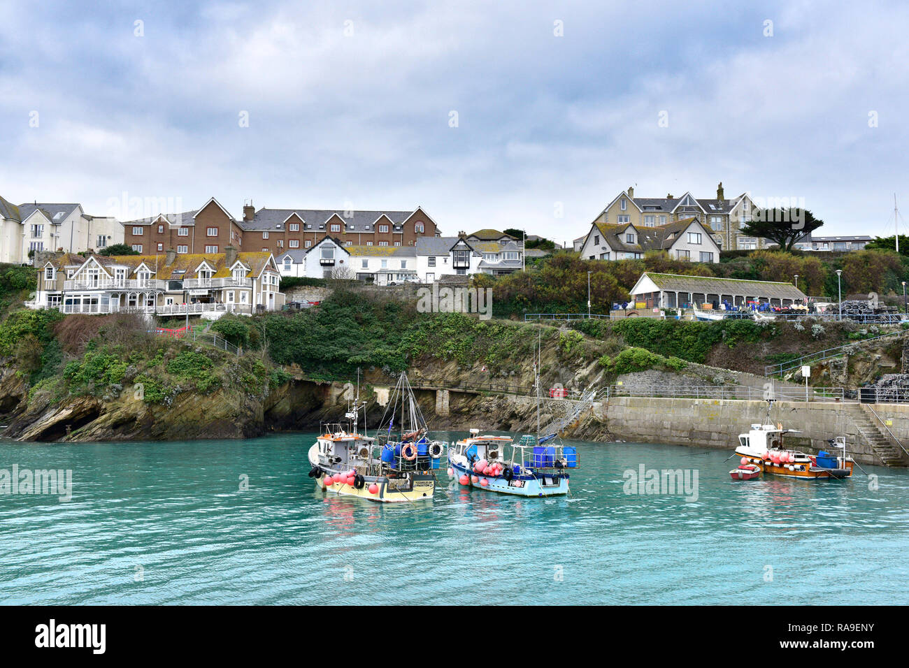 Fishing boats moored in Newquay Harbour Harbor in Newquay in Cornwall. Stock Photo