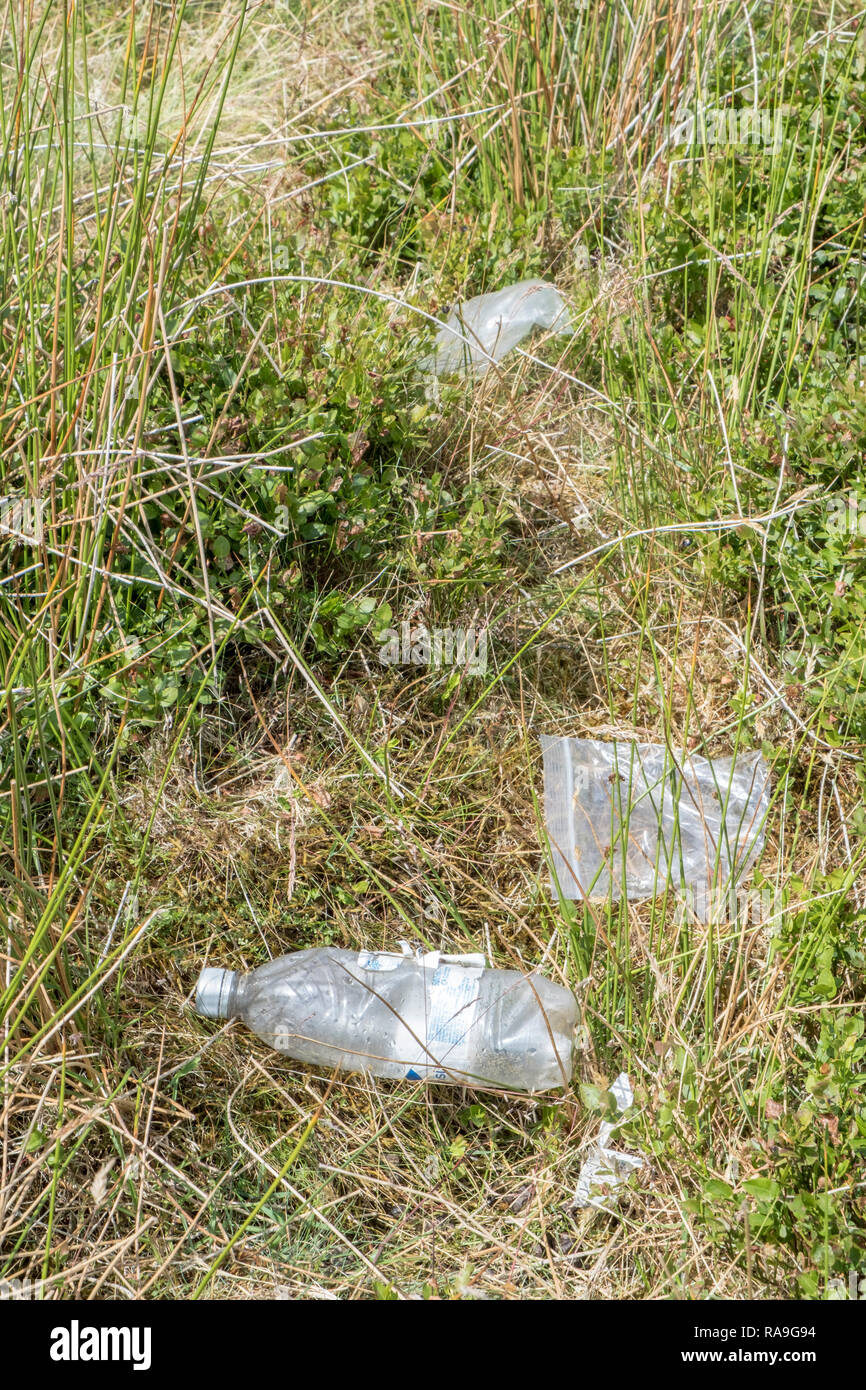 Plastic waste. Litter left on moorland, Kinder Scout, Derbyshire, Peak District National Park, England, UK Stock Photo