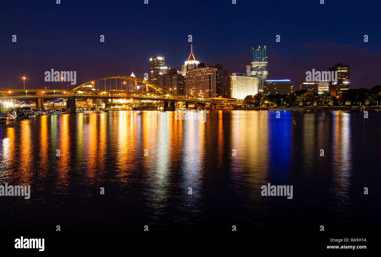Nighttime view of Pittsburgh skyline from the confluence of Allegheny and Monongahela rivers Stock Photo