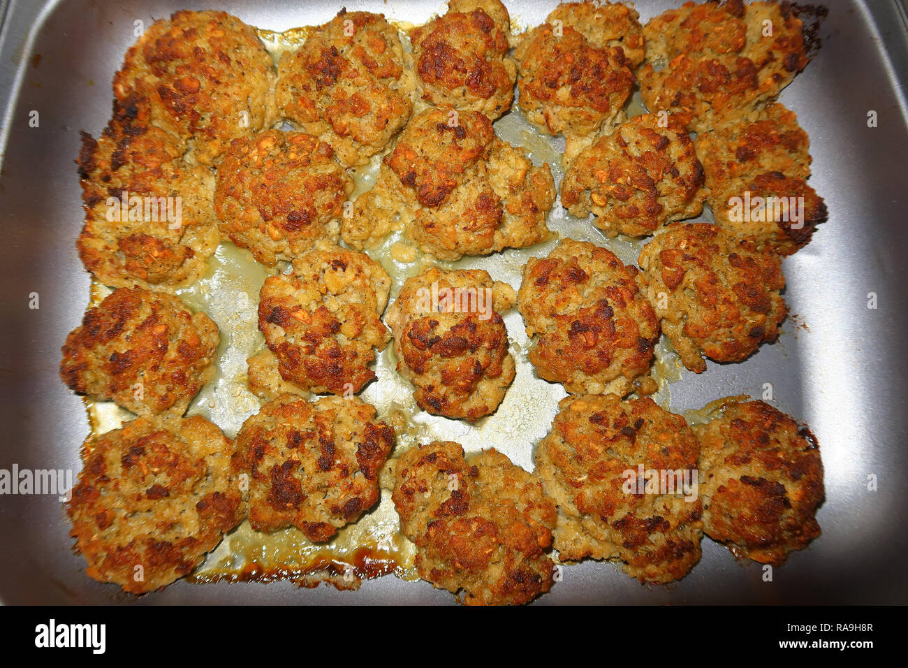 Tray full of sausage meat Stuffing balls Stock Photo Alamy