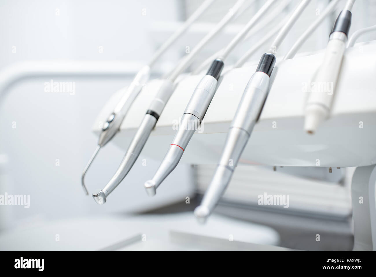 Closeup view on the professional dental instruments in the white