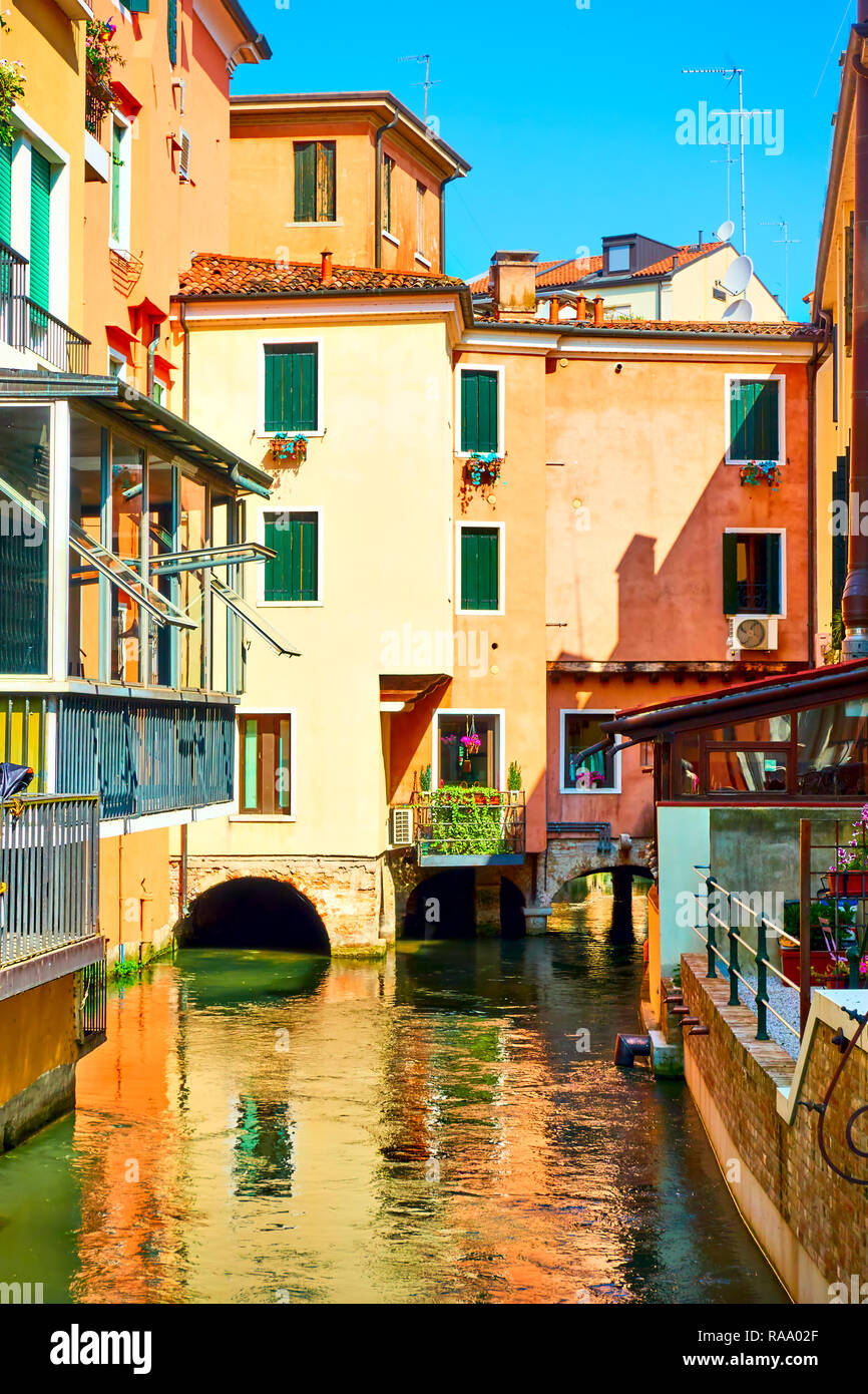 Old buildings and picturesque small canal in Treviso in the summer, Veneto, Italy Stock Photo