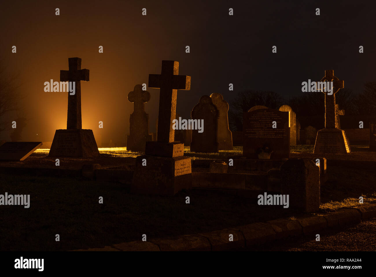 Illuminated Grave Stones Stock Photo