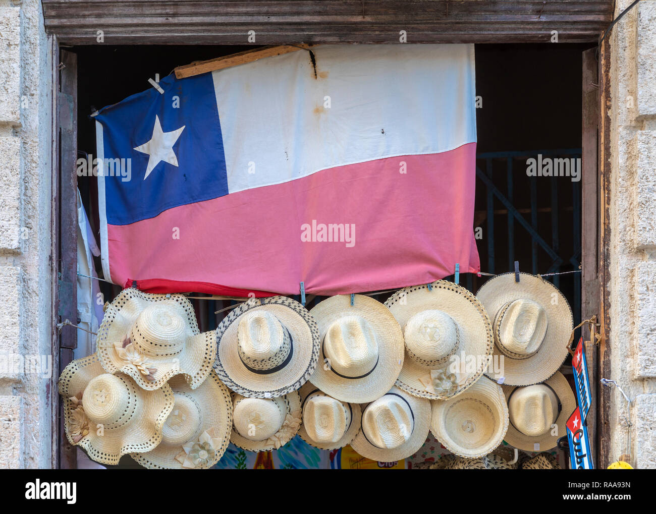 Souvenir stop with straw hats and Cuban Calle Tacon, Havana, Cuba Stock Photo