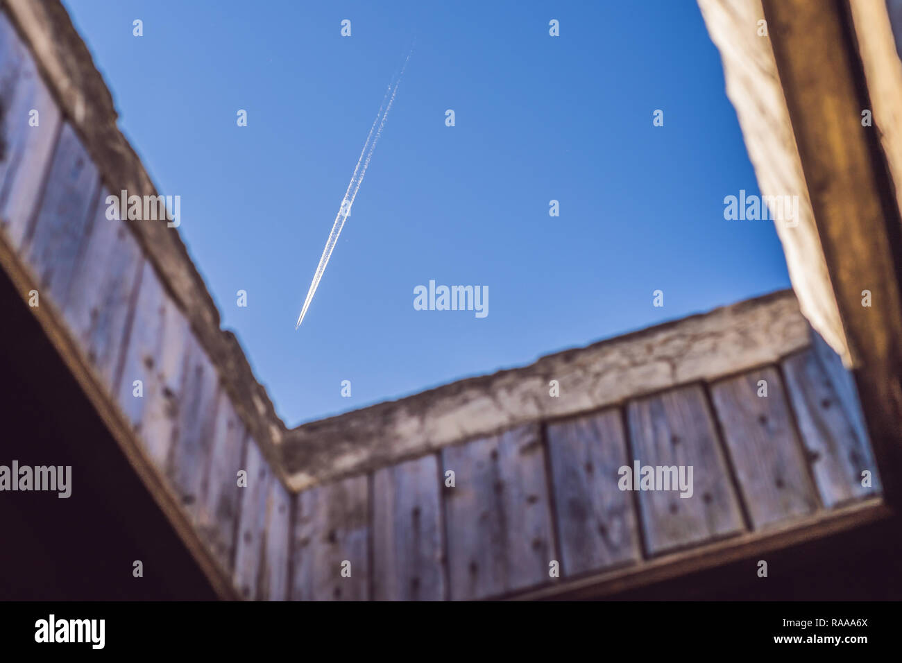 The Passenger Plane Is Flying View Through The Hole In The