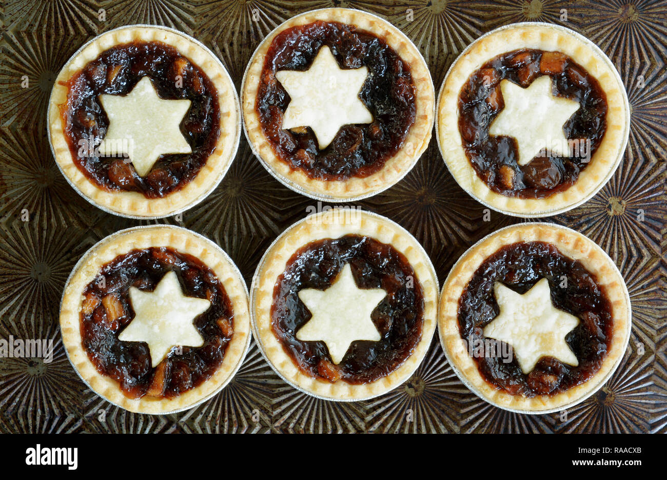 Traditional Christmas mince tarts on vintage baking sheet. Shot from ...