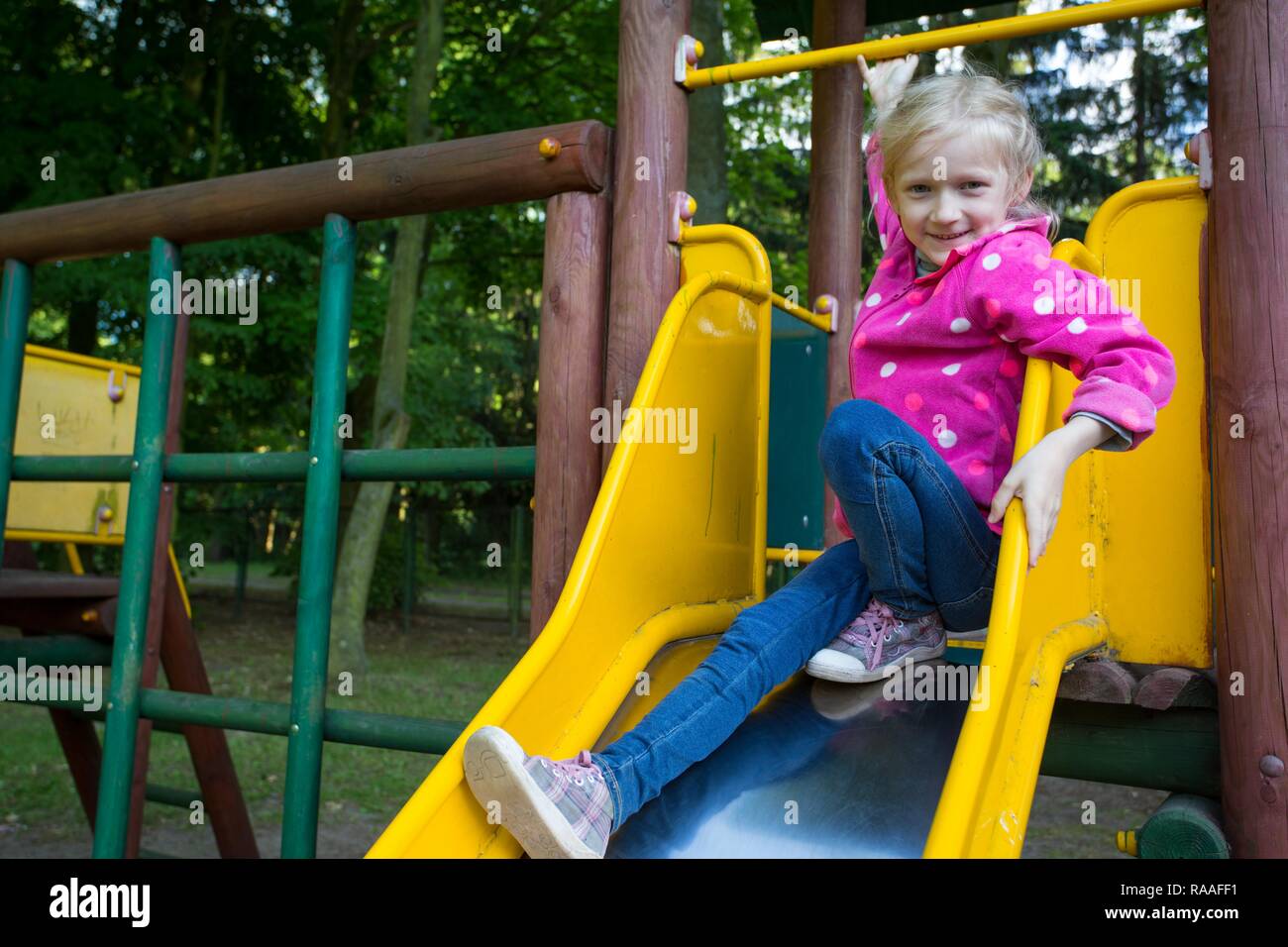smiling little girl at the playground Stock Photo - Alamy