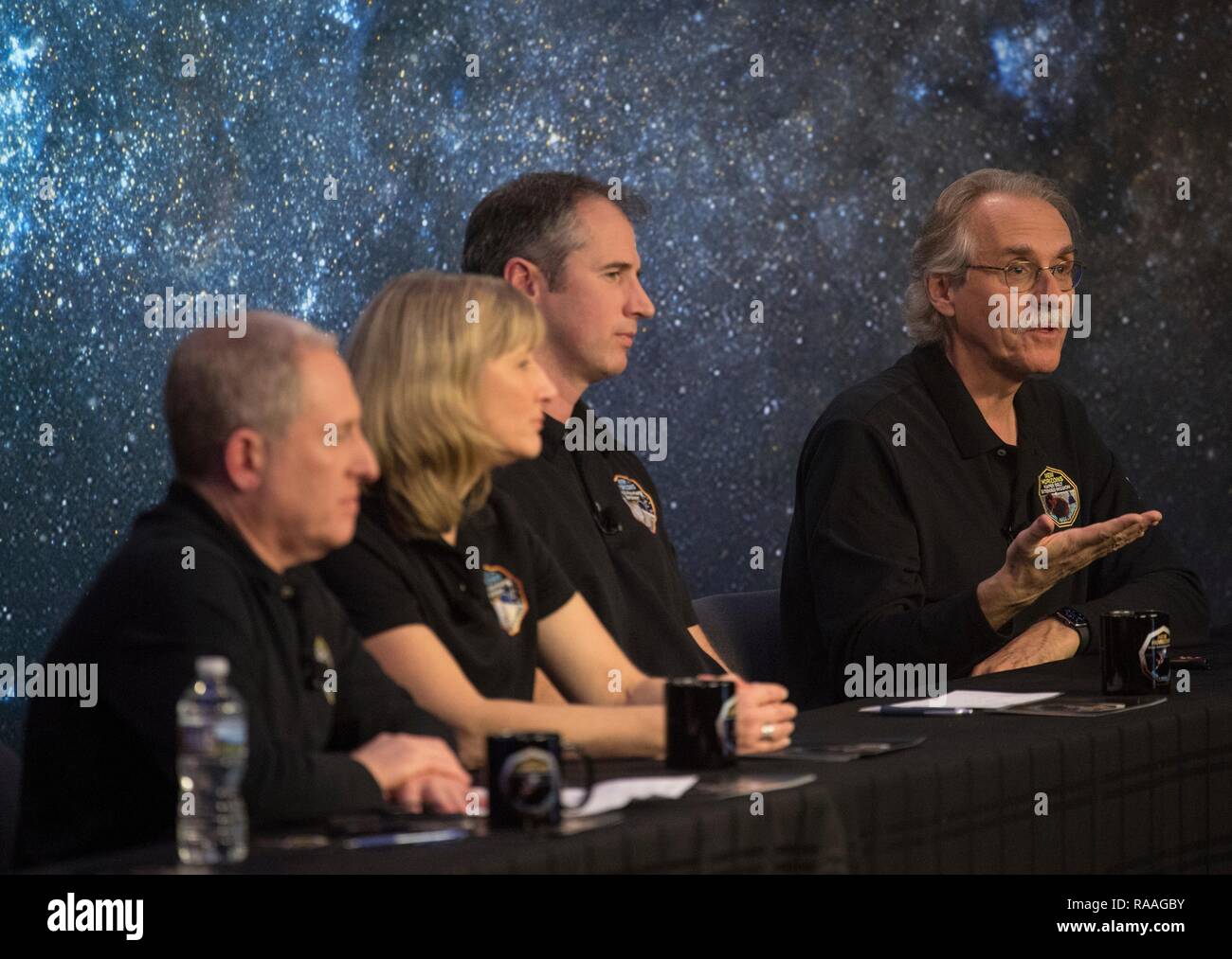 New Horizons co-investigator John Spencer, right, of the Southwest Research Institute during a briefing prior to the expected flyby of Ultima Thule by the New Horizon spacecraft at Johns Hopkins University Applied Physics Laboratory December 31, 2018 in Laurel, Maryland. The flyby by the space probe occurred 6.5bn km (4bn miles) away, making it the most distant ever exploration of an object in our Solar System. Stock Photo