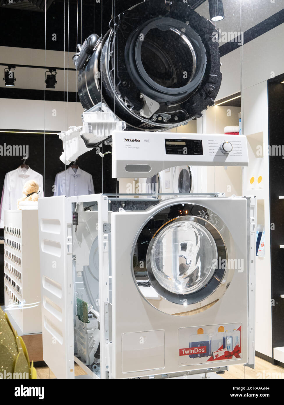 KYIV, UKRAINE - DECEMBER 30, 2018: Washing machine disassembled at Miele brand retail store showroom Stock Photo