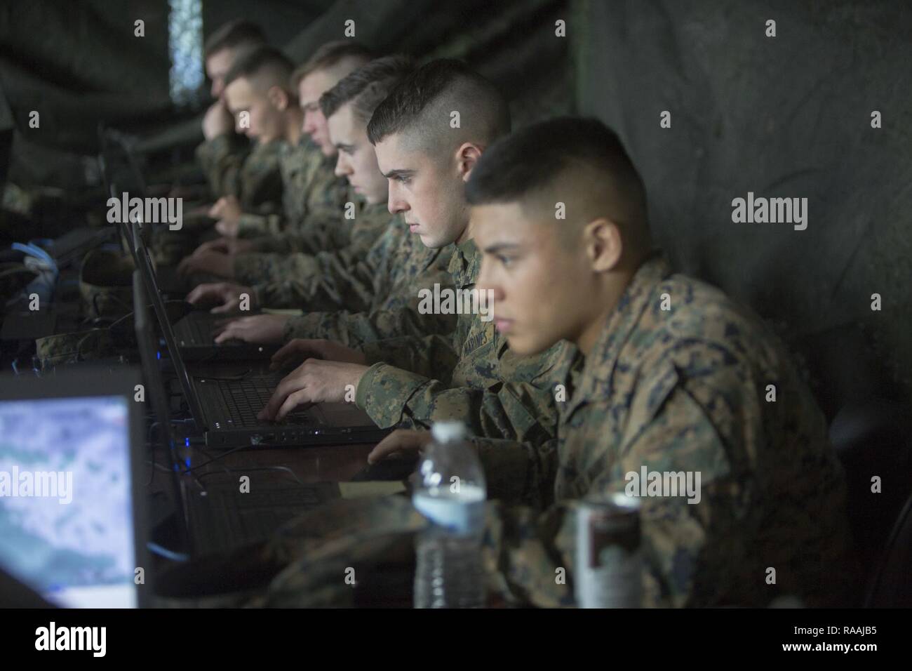 U.S. Marines with 2nd Battalion, 6th Marine Regiment, 2nd Marine Division (2d MARDIV), compete in the Spartan Tactical Games utilizing Virtual Battlespace 3 (VBS 3) on Camp Lejeune, N.C., Jan. 10, 2017. VBS 3 and the Spartan Tactical Games allow the Marines to test their tactical and cognitive thinking while competing against each other on a squad level. Stock Photo