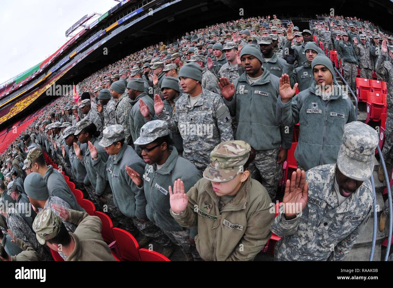 Delaware National Guard soldiers and airmen swear in as District of Columbia special police at FedEx Field in Landover, Md., Jan. 19, 2017. The Delaware troops are here in preparation of the 58th Presidential Inauguration. During the historic event, National Guard troops from almost every state and territory will provide several critical functions including crowd management, traffic control, emergency services, logistics, and ceremonial marching elements. Stock Photo