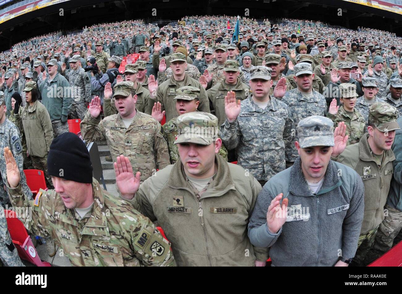 National Guard soldiers and airmen swear in as District of Columbia special police at FedEx Field in Landover, Md., Jan. 19, 2017. The National Guard members are here in preparation of the 58th Presidential Inauguration. During the historic event, National Guard troops from almost every state and territory will provide several critical functions including crowd management, traffic control, emergency services, logistics, and ceremonial marching elements. Stock Photo