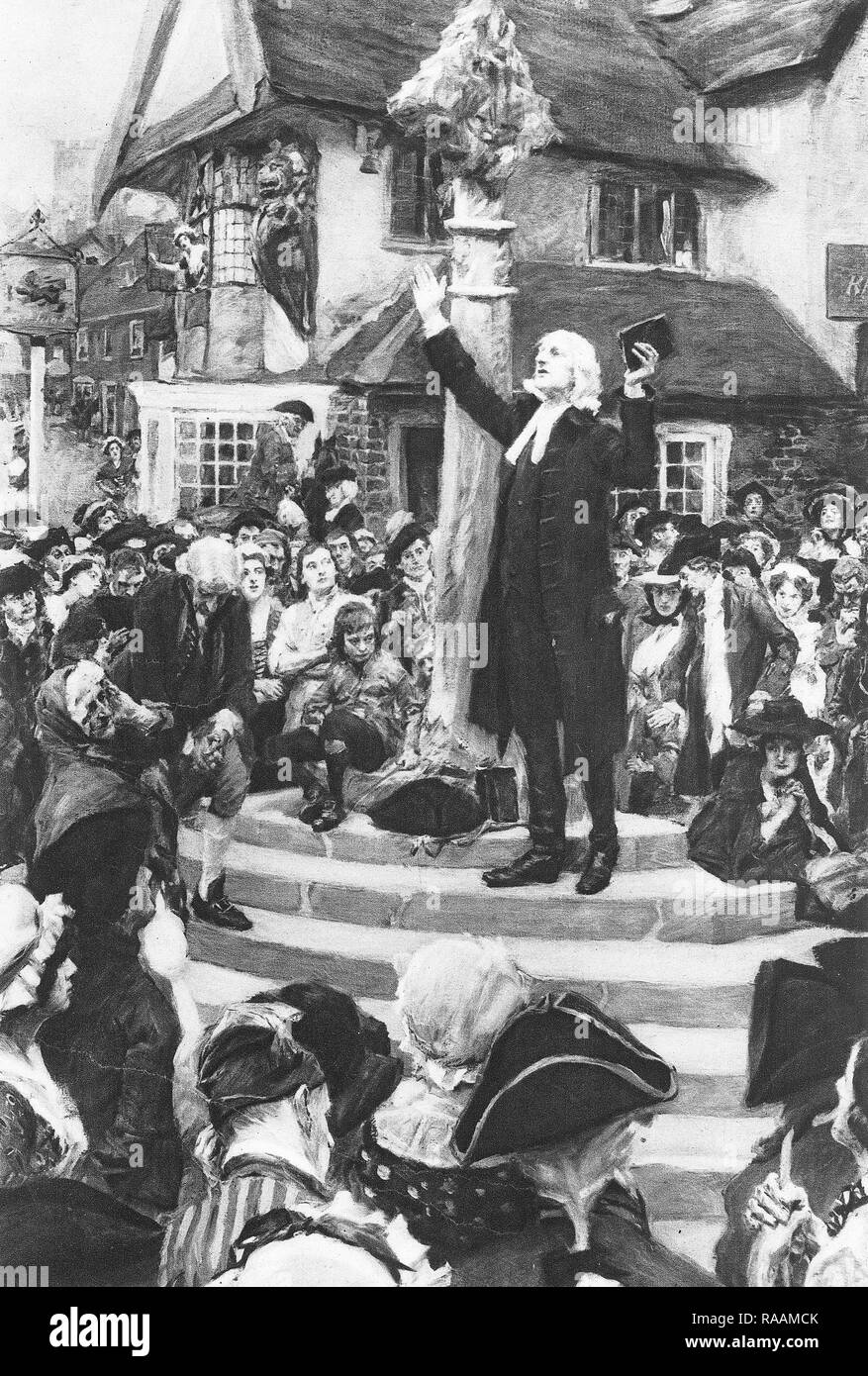 John Wesley preaching in the open air since he was banned from orthodox churches Stock Photo