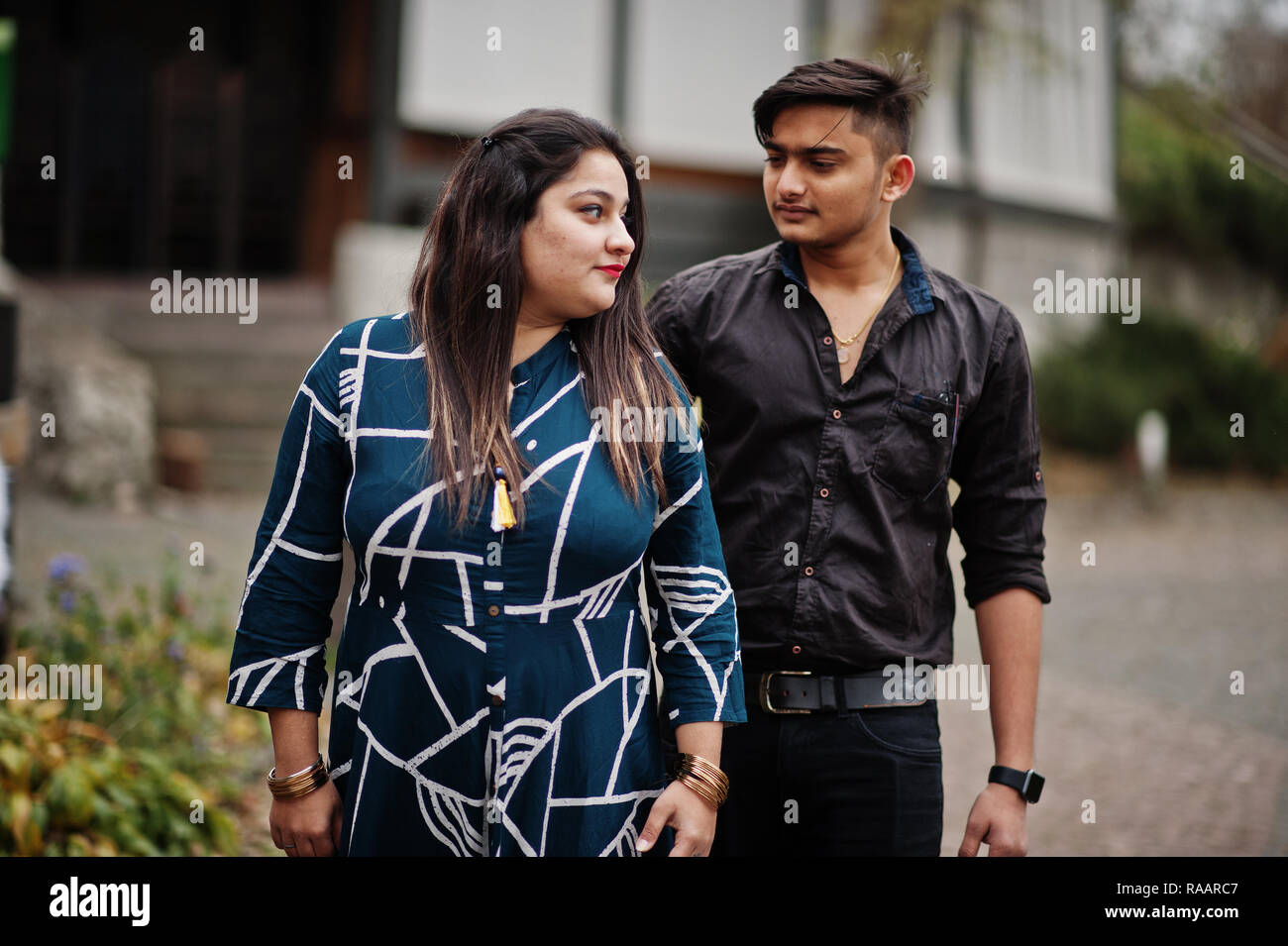 Love story of indian couple posed outdoor Stock Photo - Alamy