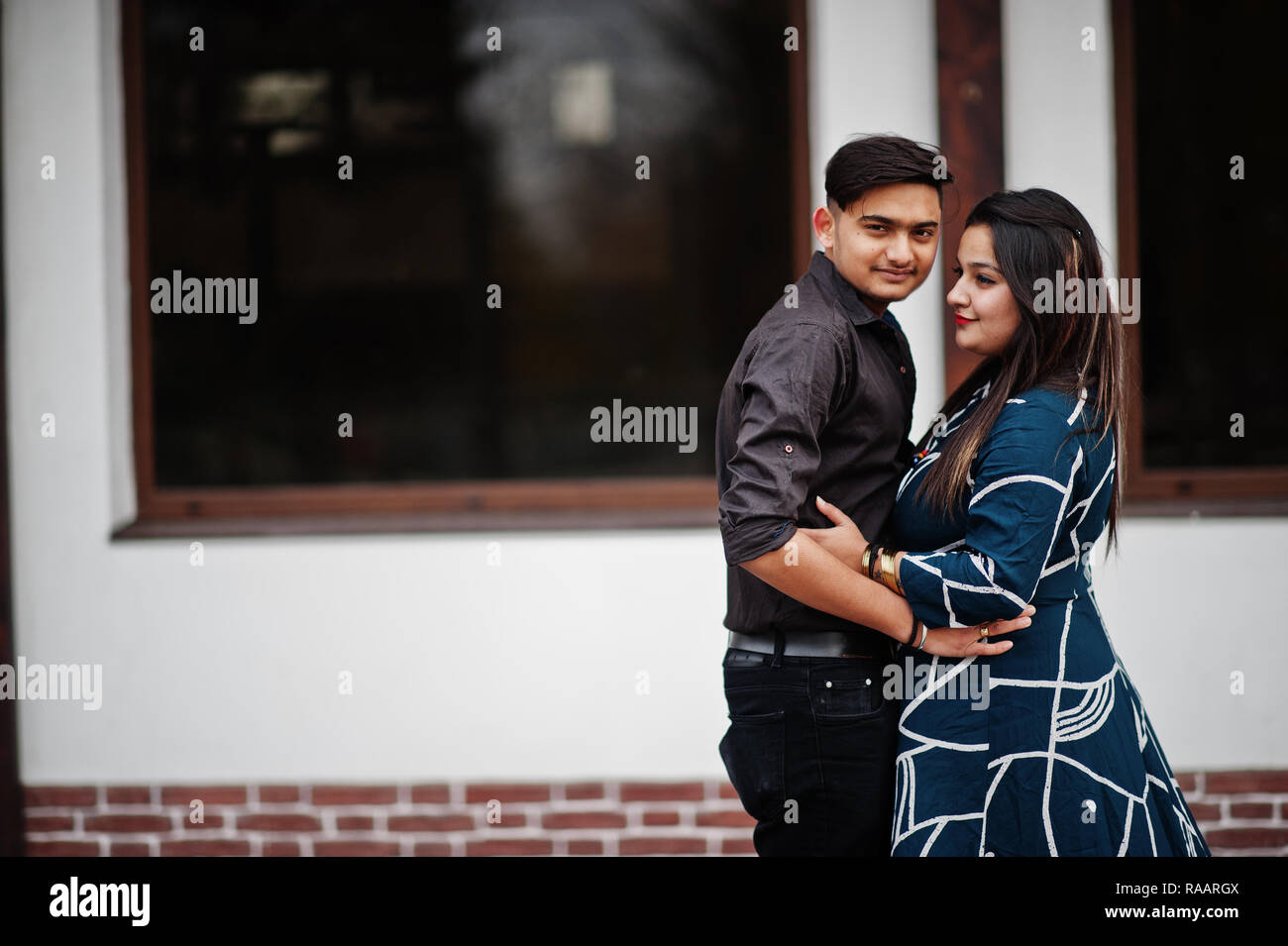 Love story of indian couple posed outdoor Stock Photo - Alamy