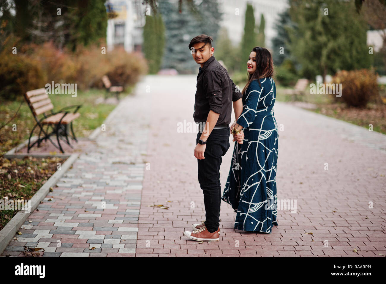Love story of indian couple posed outdoor Stock Photo - Alamy