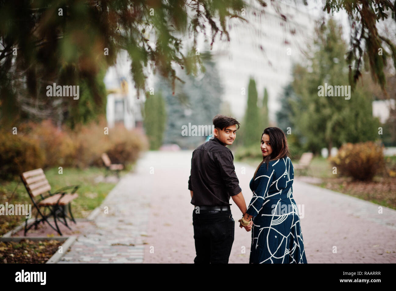 Love story of indian couple posed outdoor Stock Photo - Alamy