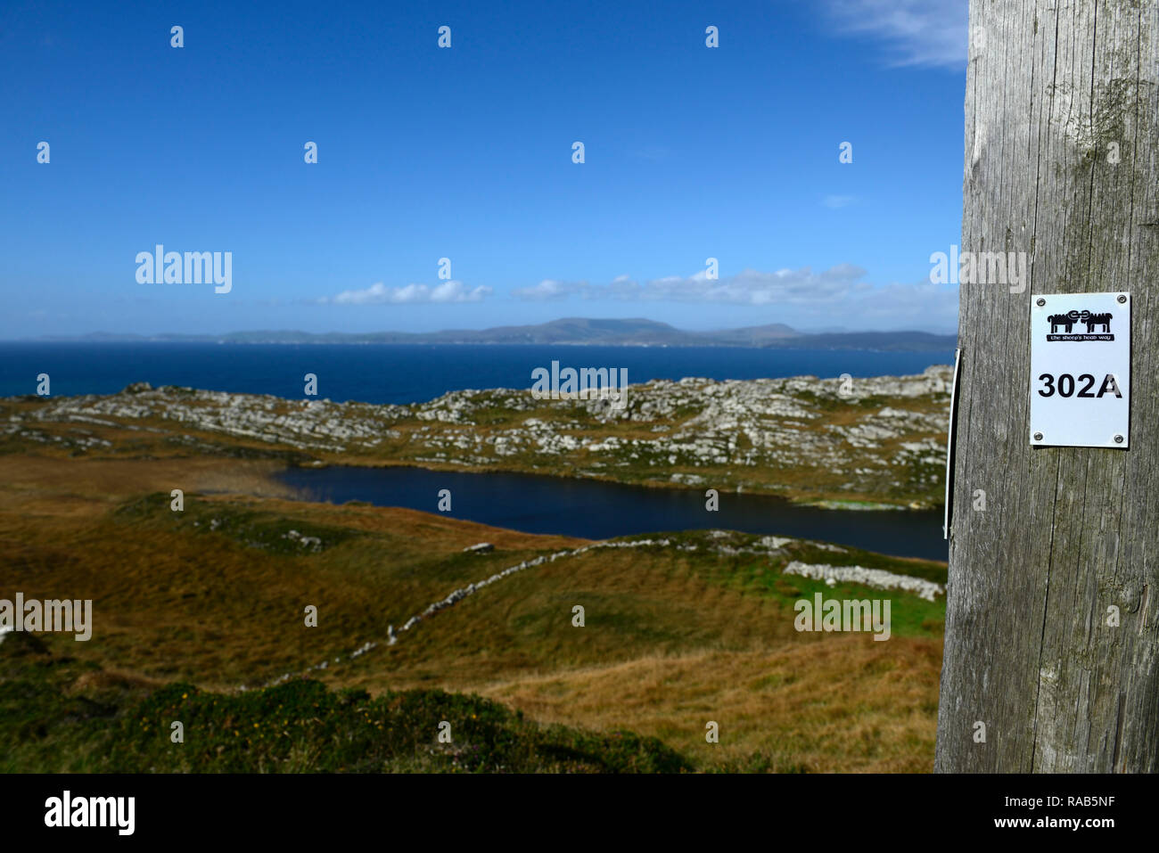 trail marker,route marker,post,sign,hiking,sheep's head way,lighthouse loop,hike,walk,trail,wild atlantic way,west cork,RM Ireland Stock Photo