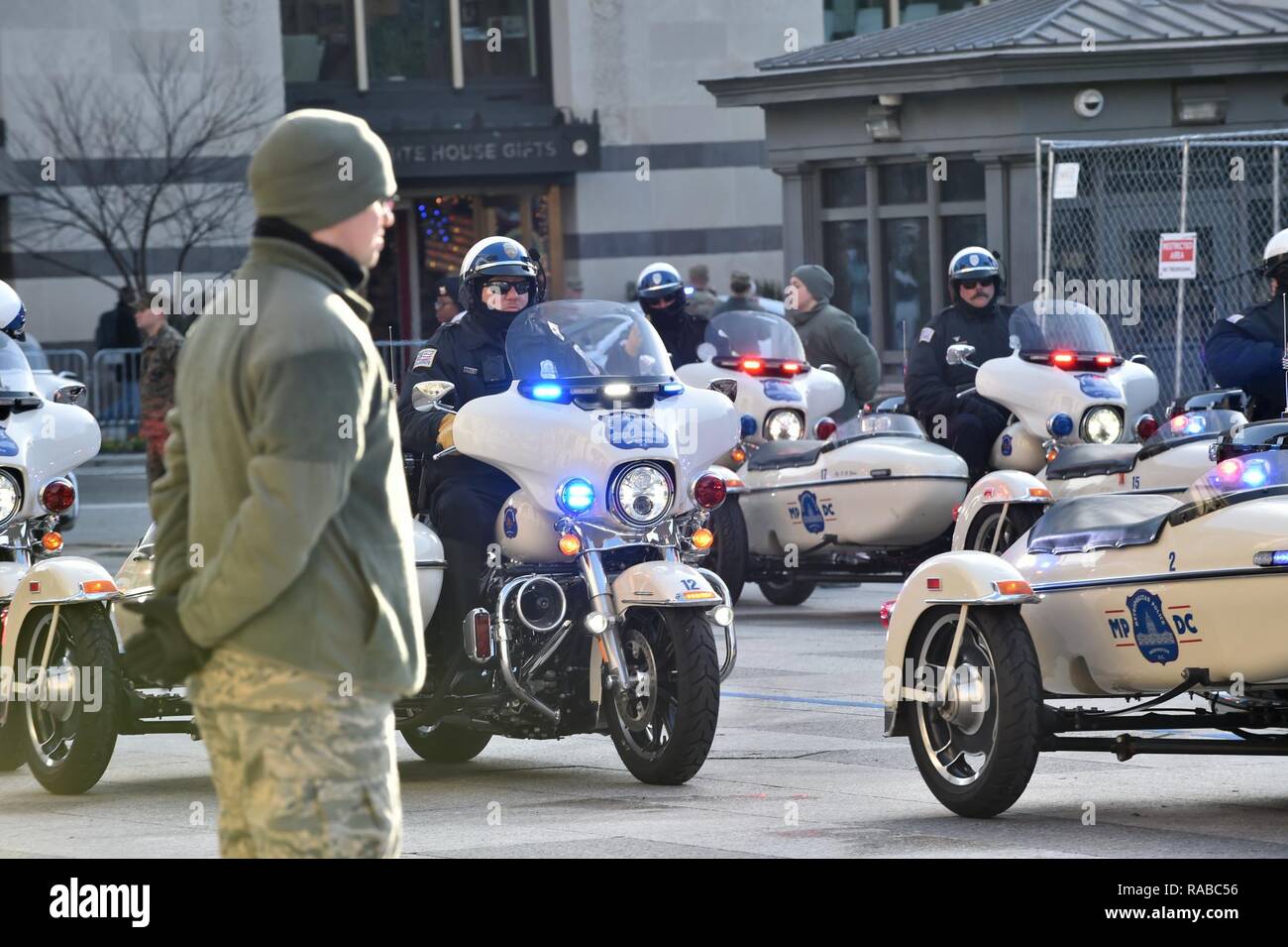 The Metropolitan Police Department of the District of Columbia leads the presidential escort on Pennsylvania Avenue during the Department of Defense rehearsal of the Inaugural parade in Washington, D.C., Jan. 15, 2017. More than 5,000 military members across from all branches of the armed forces of the United States, including Reserve and National Guard components, provided ceremonial support and Defense Support of Civil Authorities during the inaugural period. Stock Photo