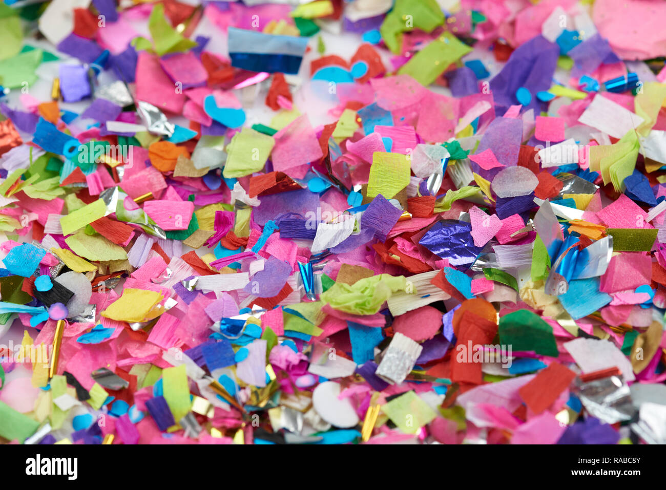 Selective focus on colorful confetti paper pieces Stock Photo