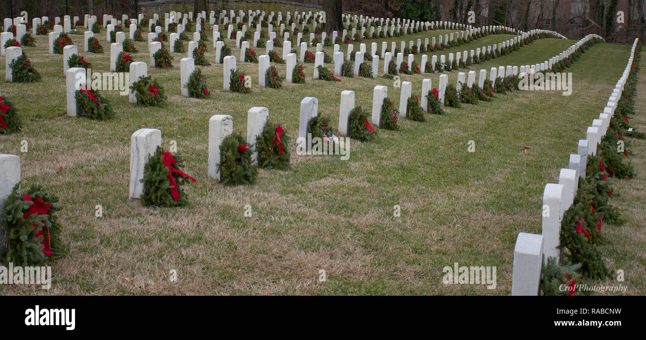 Landscape of Annapolis National Cemetery with Christmas reefs on grave