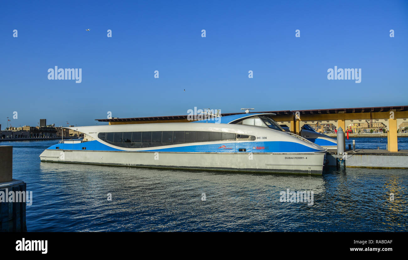 Dubai, UAE - Dec 9, 2018. A speedboat running on Dubai Creek. The creek is a man-made waterway made for the convenience of trade ships. Stock Photo