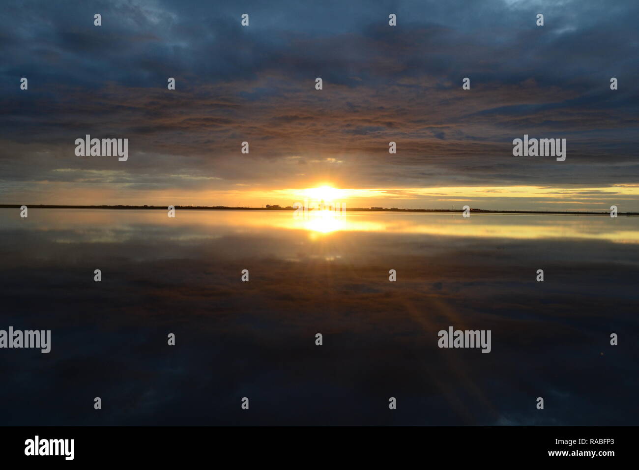 Midnight Sun in Alaska with Reflection Stock Photo
