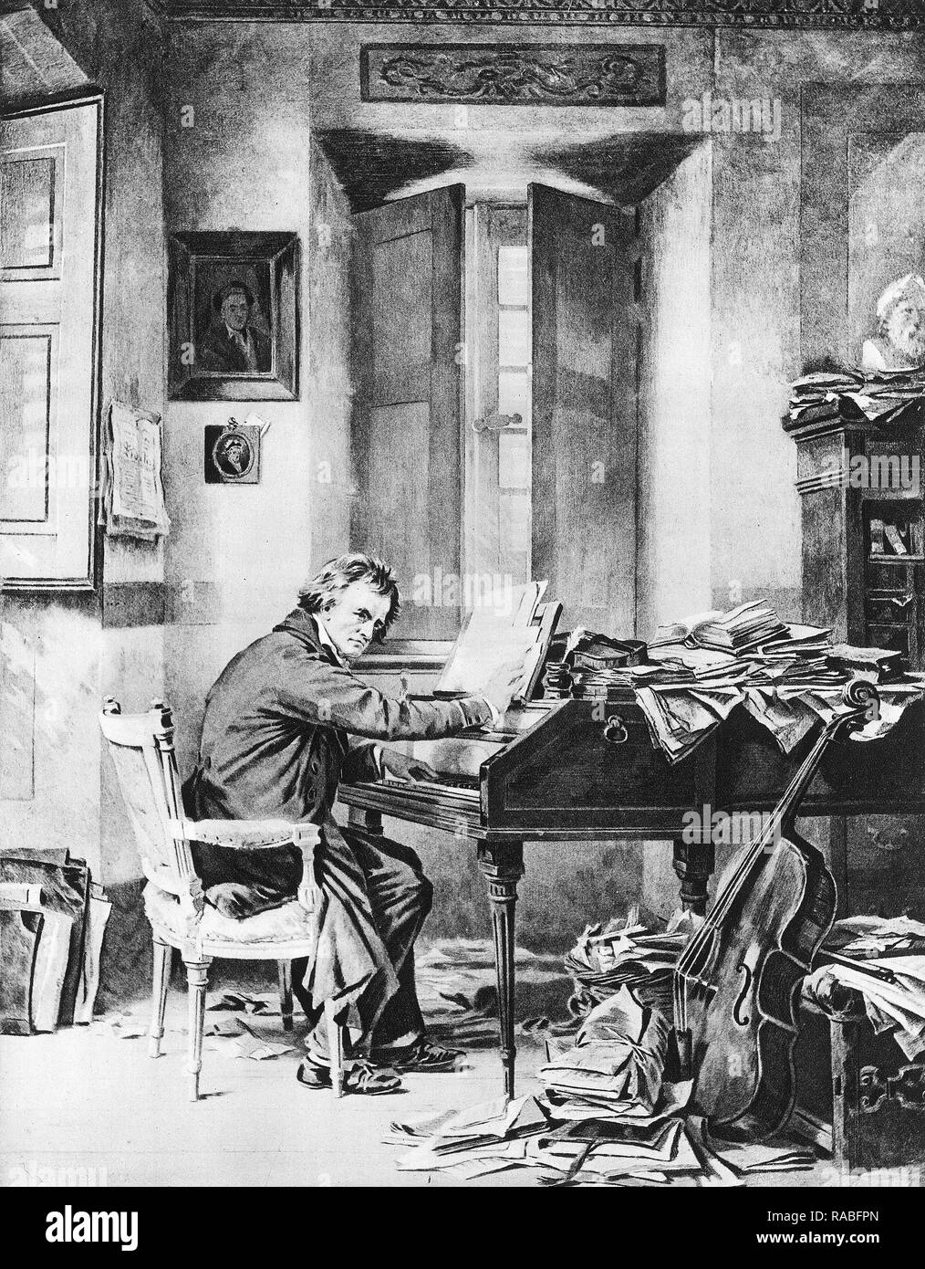 Composer Ludwig van Beethoven at work in his music studio, circa 1820 Stock Photo