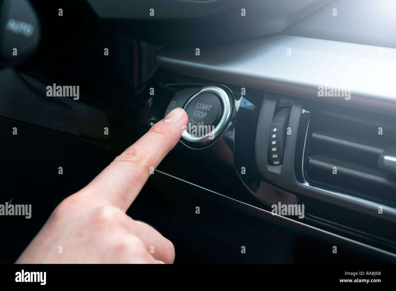 Finger press button functions car engine start and stop in motor