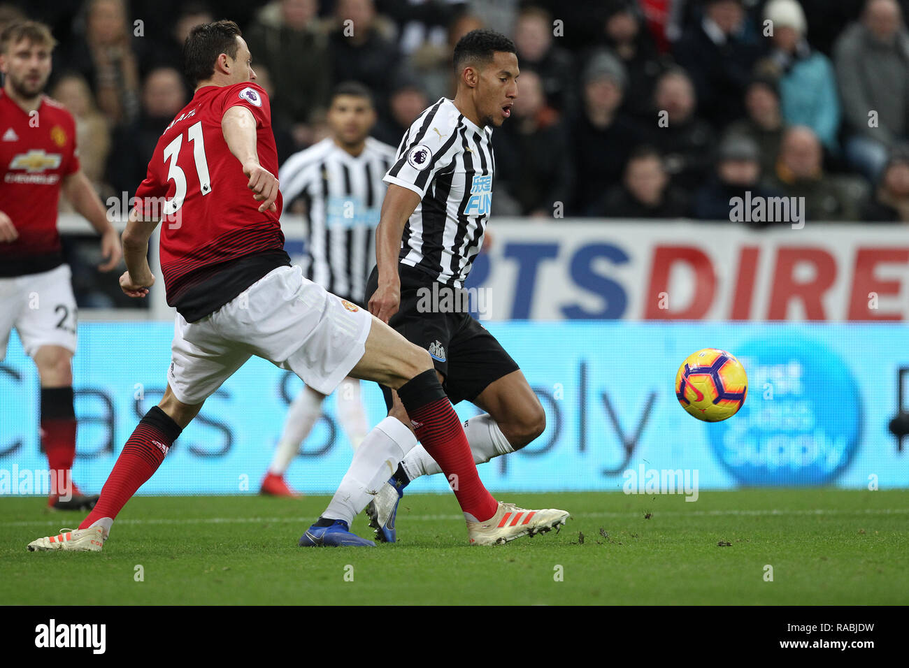 Newcastle upon Tyne, UK. 2nd Jan, 2019. 2nd Jan, 2019. Nemanja Matic of Manchester United battles with Isaac Hayden of Newcastle United during the Premier League match between Newcastle United and Manchester United at St. James's Park, Newcastle on Wednesday 2nd January 2019. Credit: MI News & Sport /Alamy Live News Stock Photo