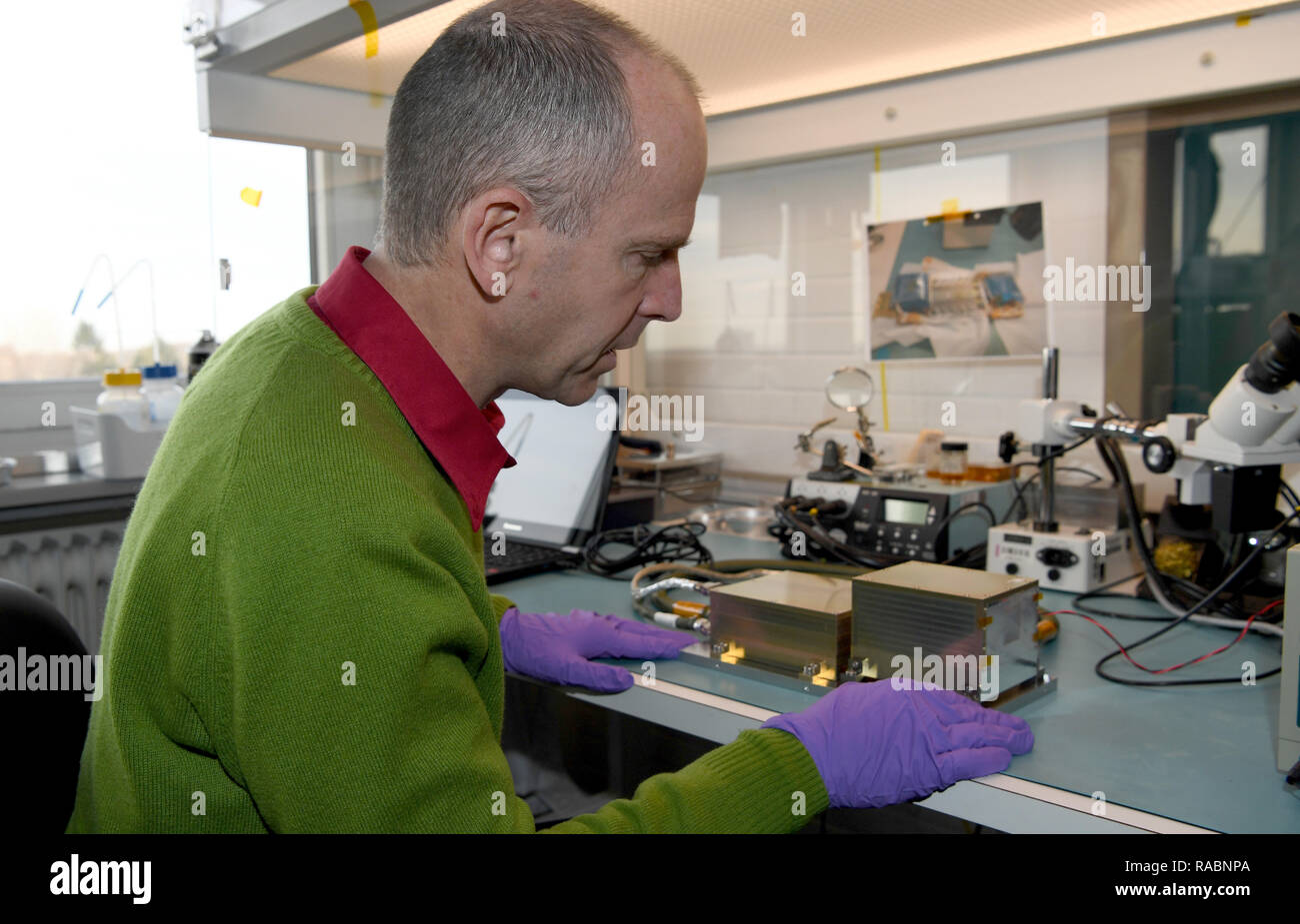 Kiel, Germany. 03rd Jan, 2019. Robert Wimmer-Schweingruber, Professor of Physics at the University of Kiel, shows a 'Lunar Lander Neutron Dosimetry (LND). Scientists from Kiel are involved in a research project on the Chinese lunar probe 'Chang'e 4'. They want to study neutron radiation in particular. Credit: Carsten Rehder/dpa/Alamy Live News Stock Photo