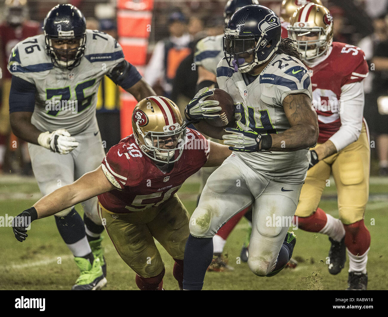 Seattle Seahawks Leon Washington (33) tries to fend off San Francisco 49ers  Justin Smith at Candlestick Park in San Francisco on December 12, 2010. The  49ers defeated the Seahawks 40-21 UPI/Terry Schmitt