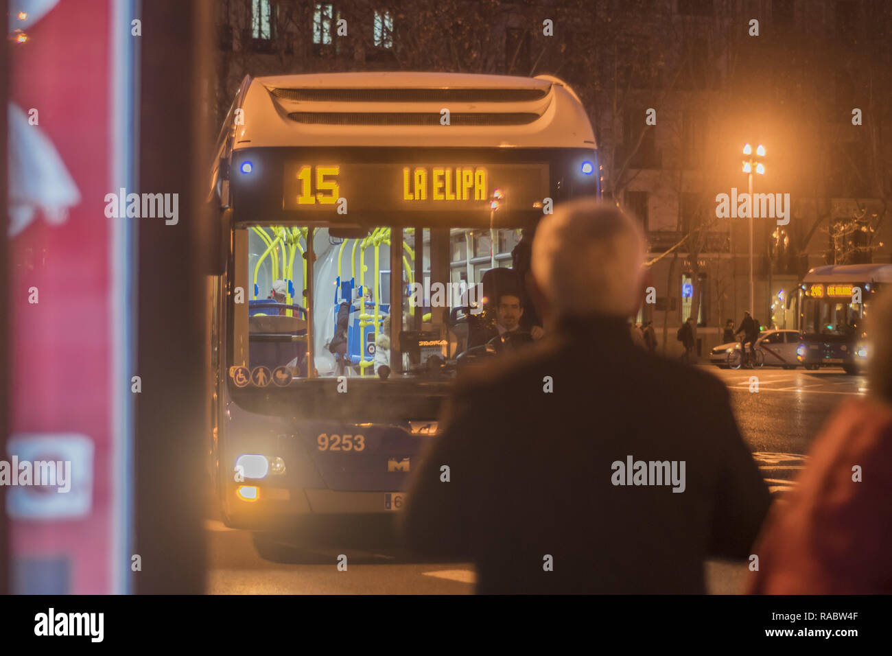 January 3, 2019 - Madrid, Madrid, Spain - A passenger seen waiting for a bus..The EMT transport of Madrid, transported more than 420 million users in 2018. As reported by the Consistory, for months, the record of travelers was broken in October, with 40.5 million users. In 2018, EMT transported 442,000 passengers in the Substitute Subway Special Services provided in summer by partial cuts on line 9, compared to 10.16 million in 2017. (Credit Image: © Alberto Sibaja/SOPA Images via ZUMA Wire) Stock Photo